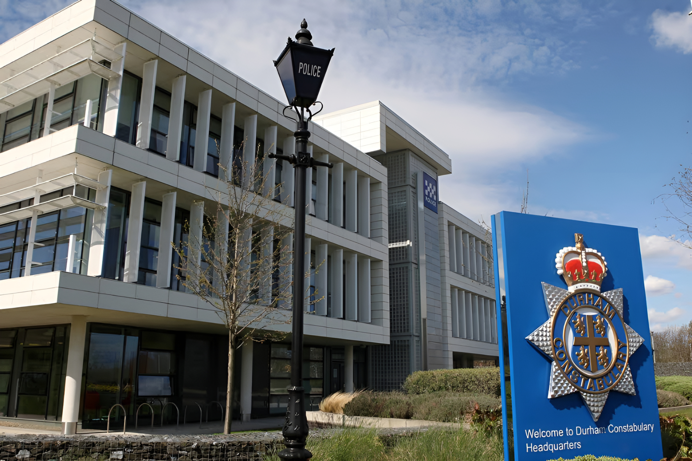 Aykley headquarters external view showing main elevation corner and posice sign in front
