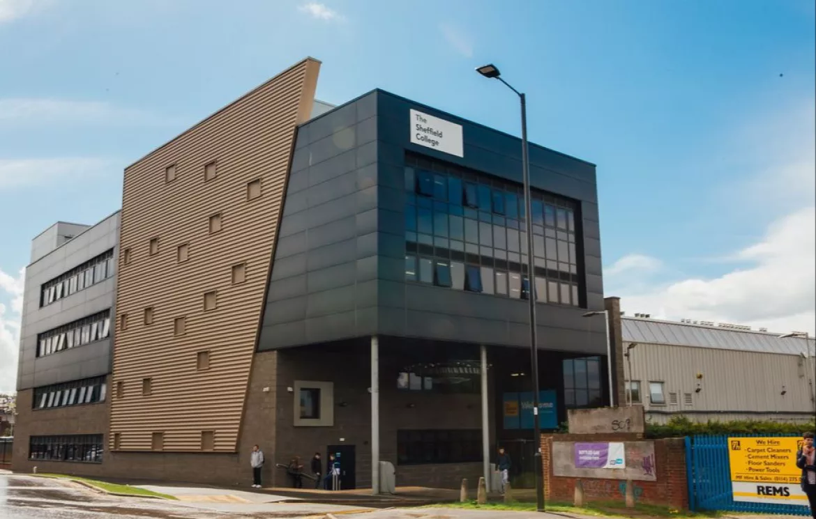 Olive Grove Campus Sheffield College night time external shot of the main building in the day