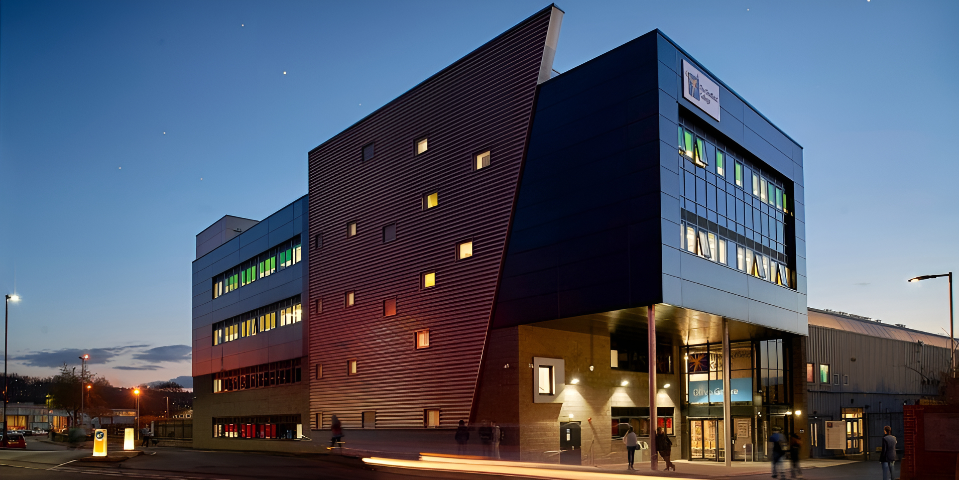 Olive Grove Campus Sheffield College night time external shot of the main building