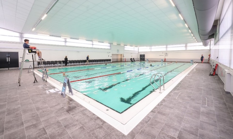 The 25m community pool in the new extension at Ripon, with ventilation ductwork running along the hall, MEP design by CAD21